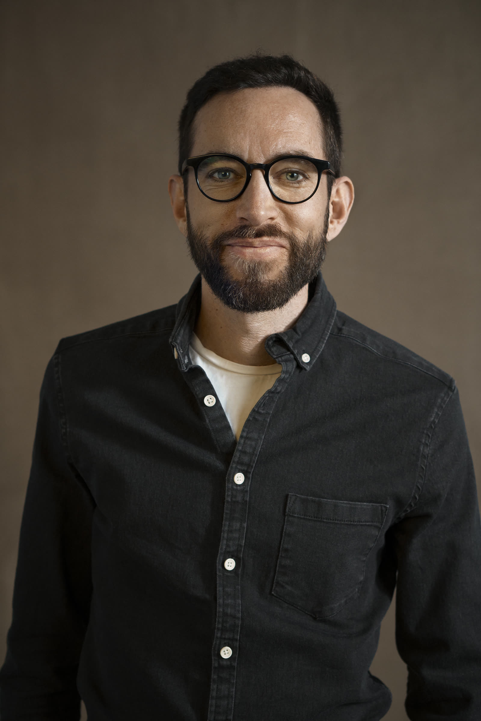 Tobias Runeson wearing glasses and a dark shirt